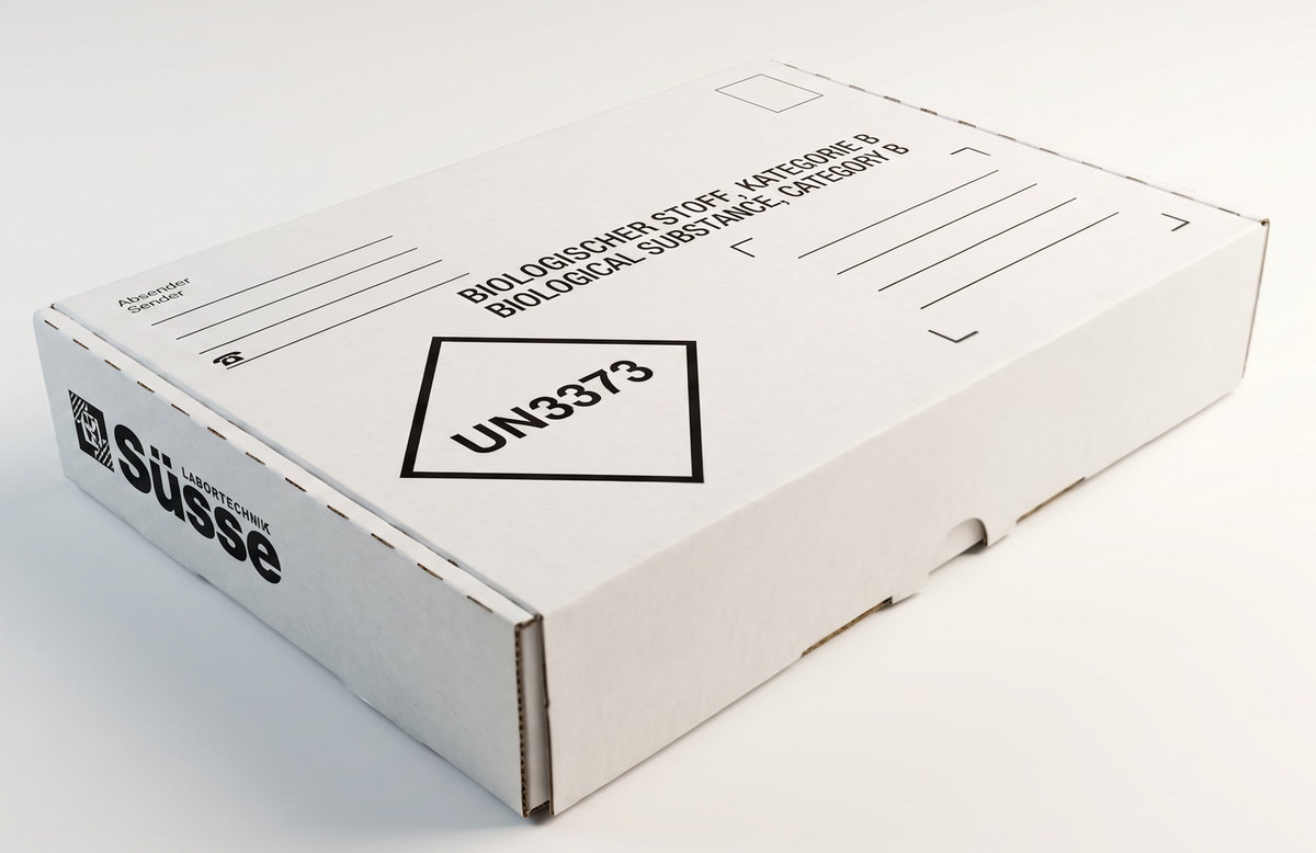 Süsse Post Box item no. 11225: flat, rigid mailing box in white board with the Süsse logo, a return-address field and UN3373 printing together with the designation Biological Substance Category B in German and English.